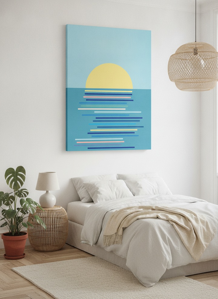 Stretched canvas wall art styled on the wall in a bright Scandinavian bedroom