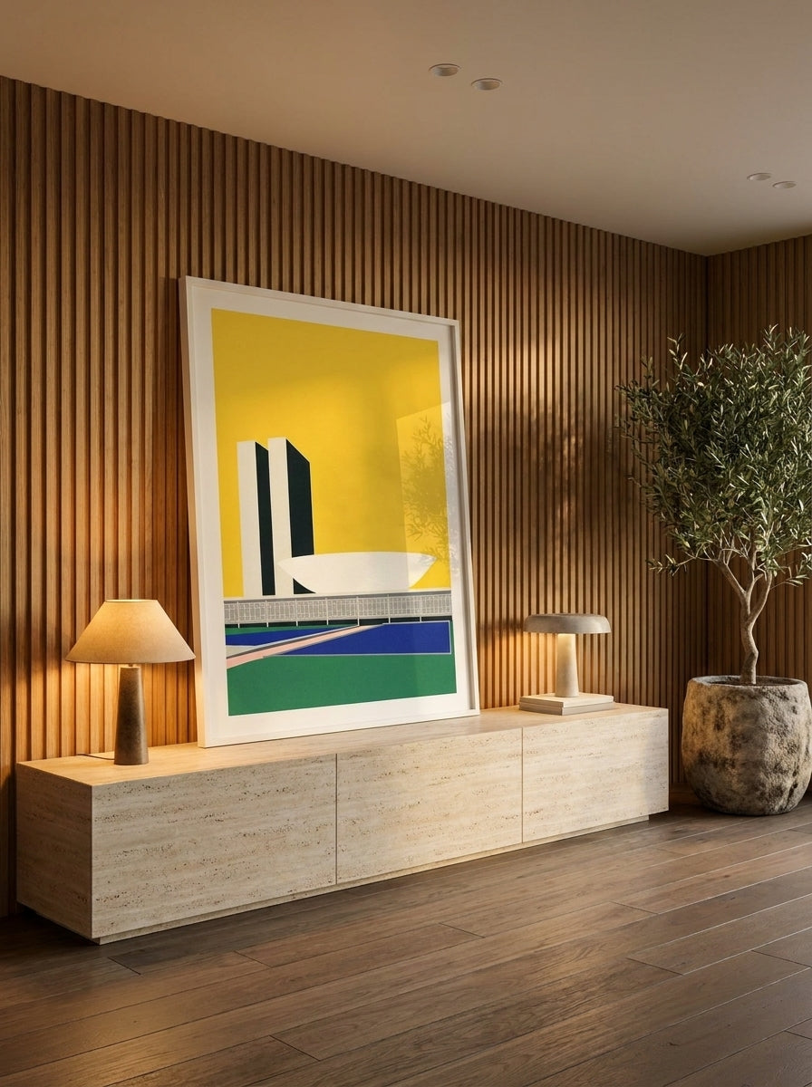 Modern wall art print standing on a console in a luxe bedroom