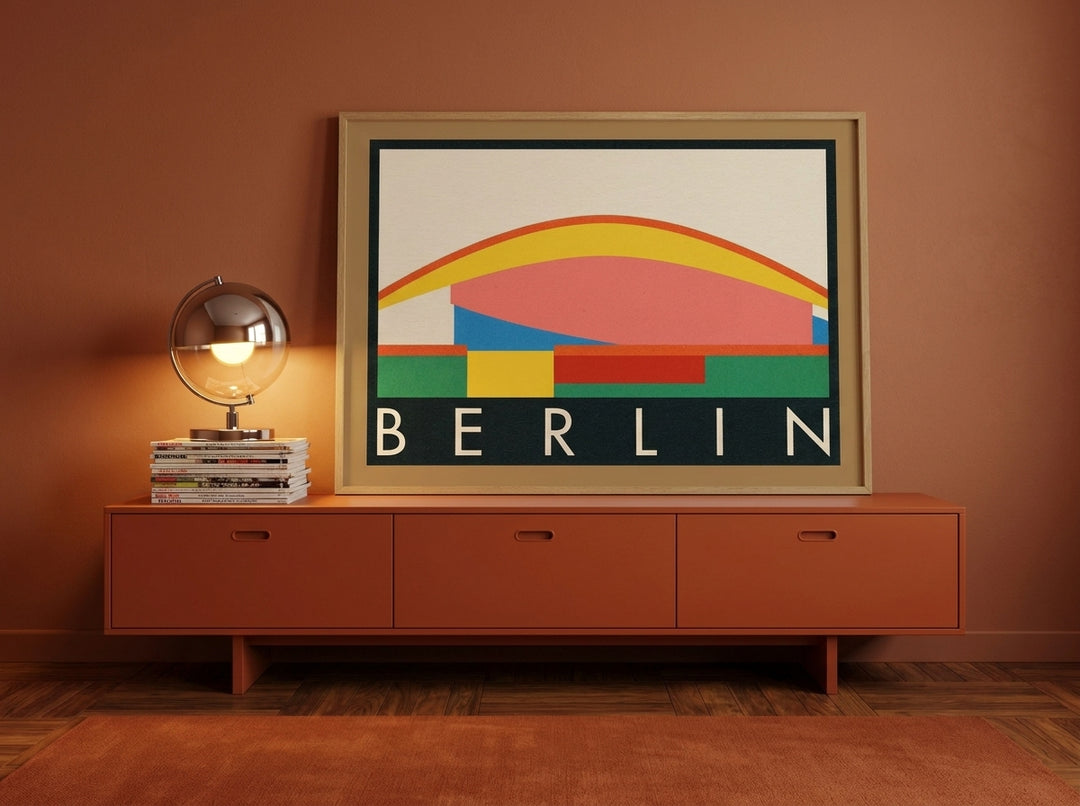 Modern wall art print standing on a sideboard in a retro 70s dining room