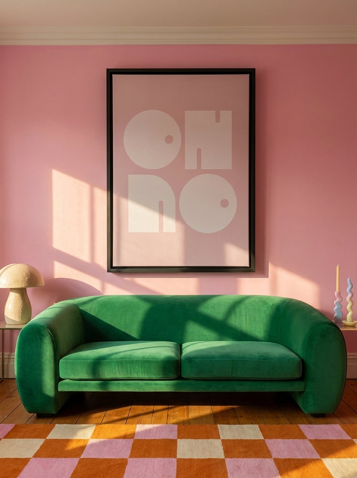 Oversized statement canvas wall art with a black surround styled on the wall in a colourful eclectic living room