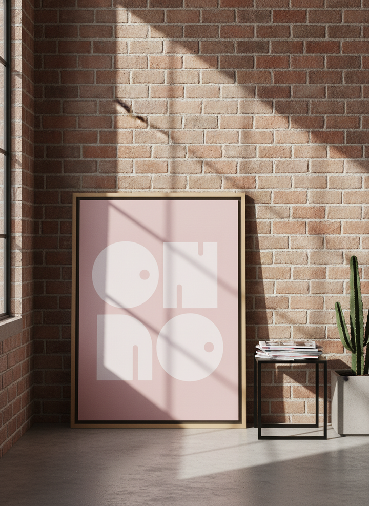 Canvas wall art with a natural timber surround leaning against the wall in an industrial loft bedroom