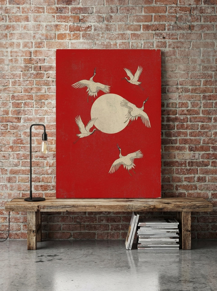 Stretched canvas wall art standing on a bench in an industrial loft home office