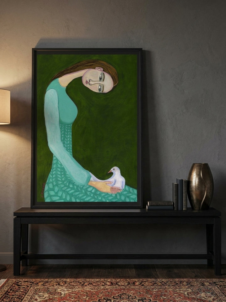 Modern wall art print standing on a console in a moody bedroom