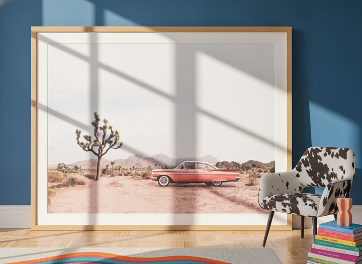 Oversized statement modern wall art print leaning against the wall in a colourful eclectic dining room