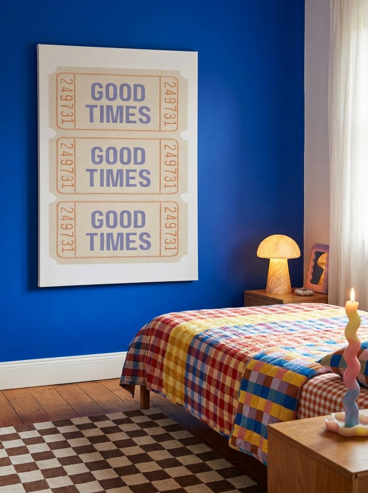 Stretched canvas wall art styled on the wall in a colourful eclectic bedroom
