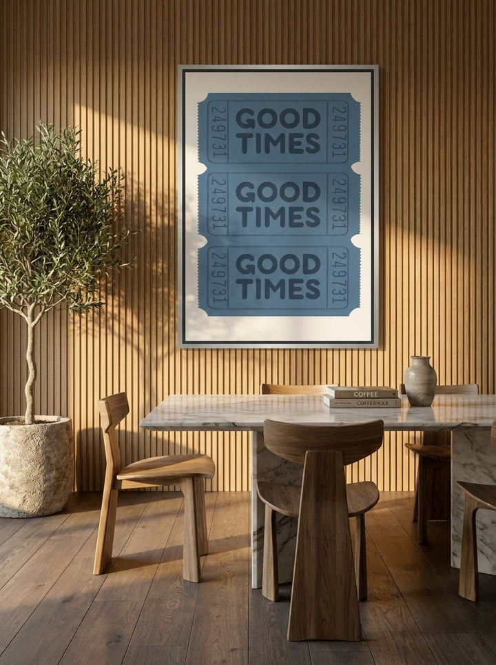 Canvas wall art with a silver leaf surround styled on the wall in a luxe dining room