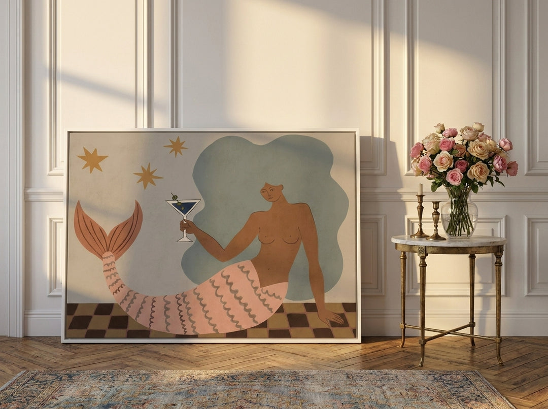 Canvas wall art with a white surround leaning against the wall in a Parisian kitchen
