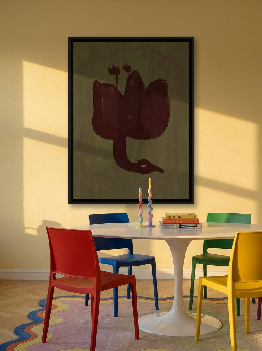 Oversized statement canvas wall art with a black surround styled on the wall in a colourful eclectic dining room