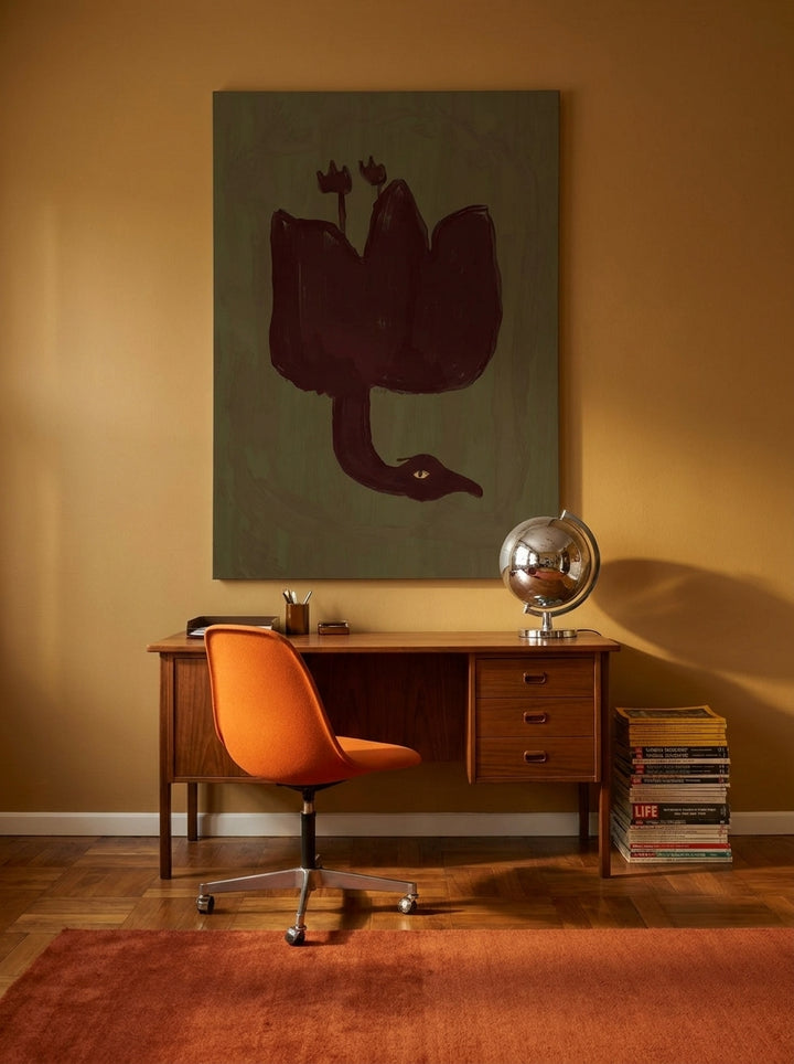 Stretched canvas wall art styled on the wall in a retro 70s home office