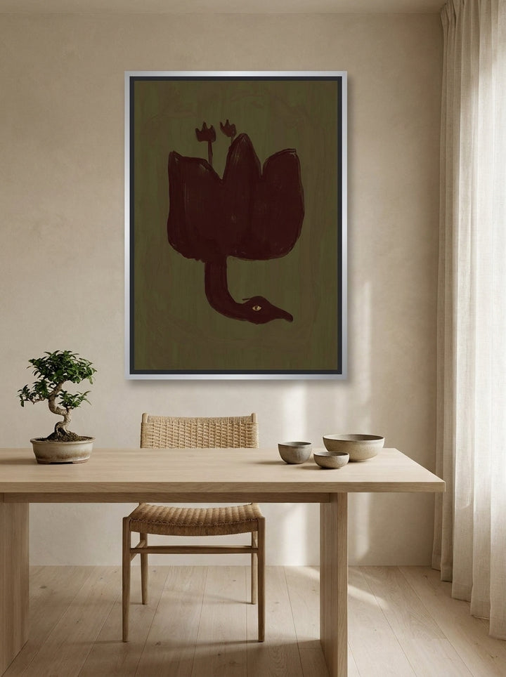 Canvas wall art with a silver leaf surround styled on the wall in a warm Japandi home office