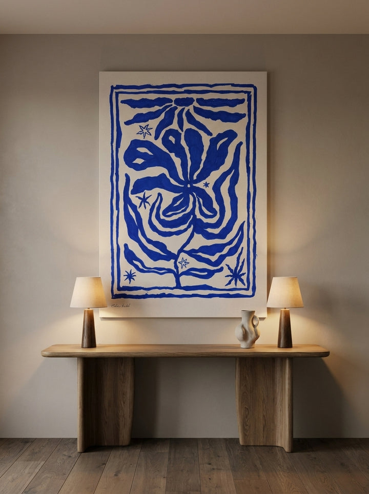 Stretched canvas wall art styled on the wall in a luxe home office