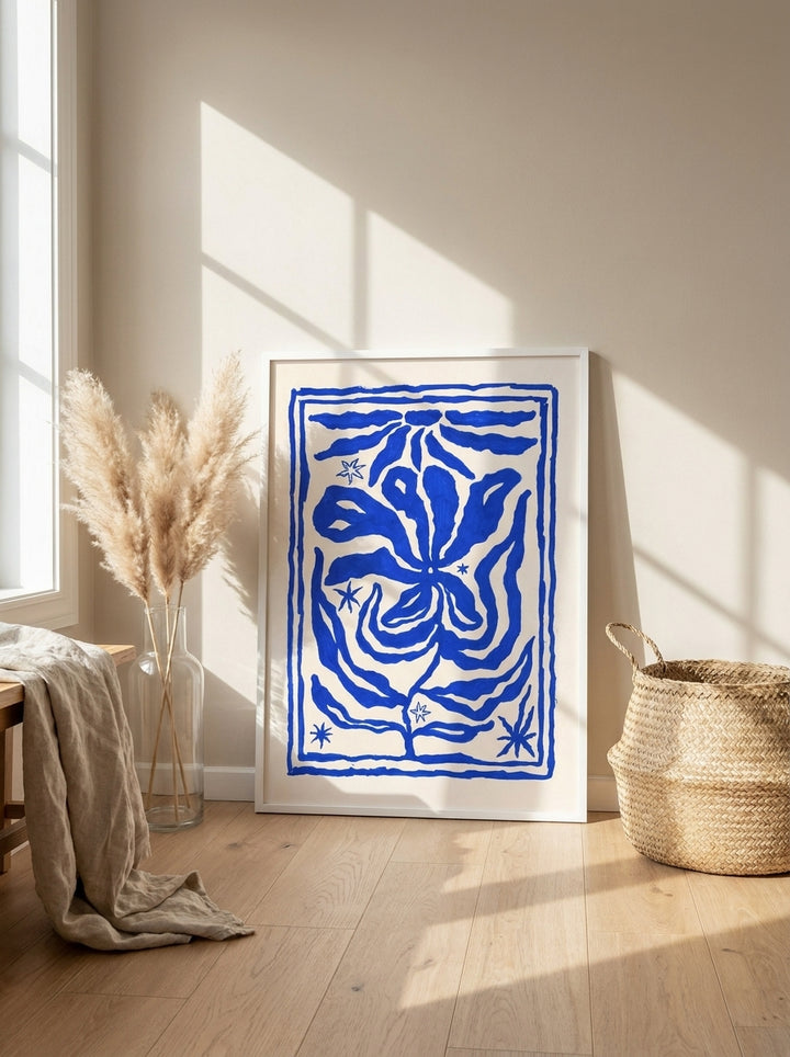Modern wall art print leaning against the wall in a coastal home office