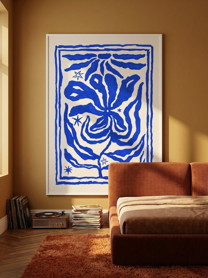 Modern wall art print styled on the wall in a retro 70s bedroom