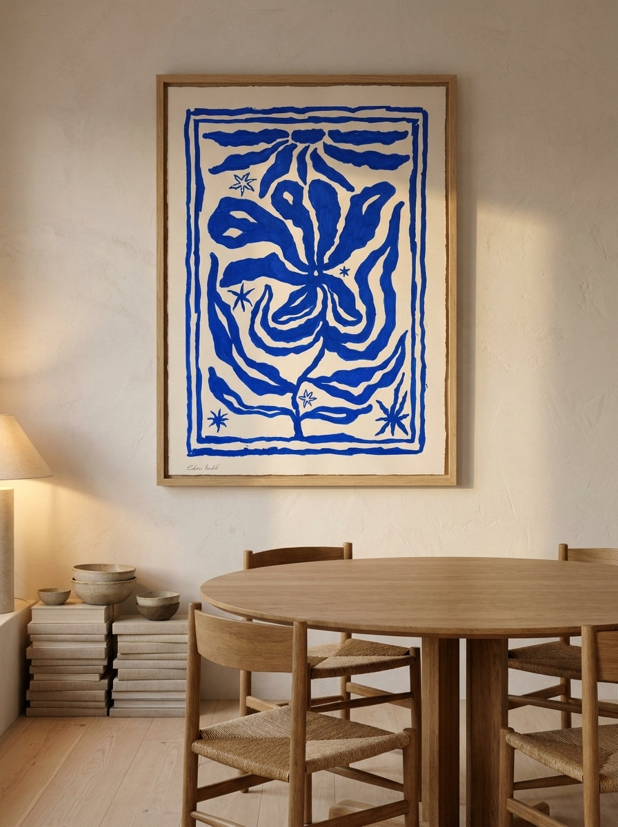 Oversized statement modern wall art print styled on the wall in a warm Japandi dining room