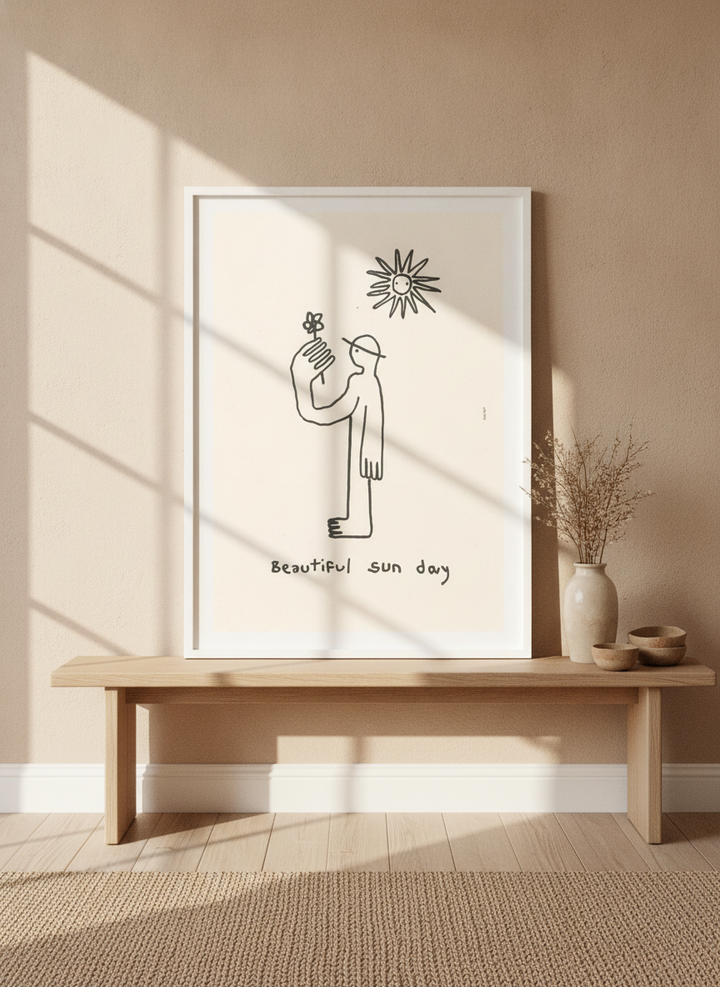 Modern wall art print standing on a bench in a warm Japandi nursery