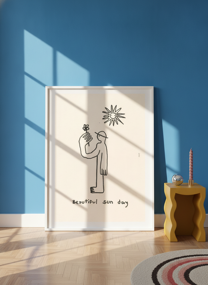 Oversized statement modern wall art print leaning against the wall in a colourful eclectic living room