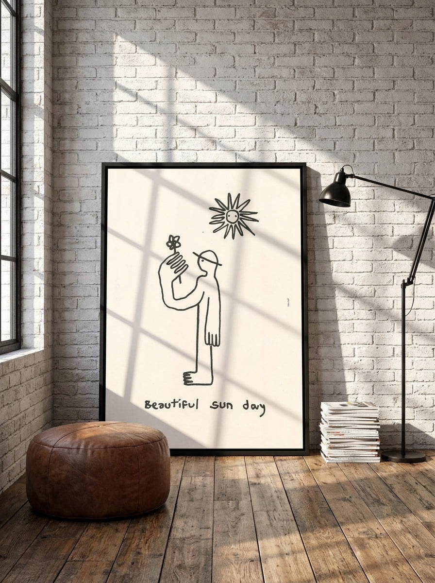 Canvas wall art with a black surround leaning against the wall in an industrial loft home office