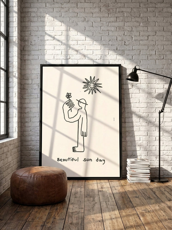Canvas wall art with a black surround leaning against the wall in an industrial loft home office