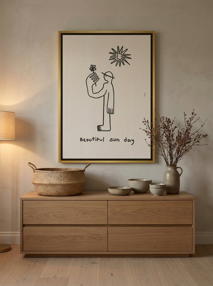 Canvas wall art with a gold leaf surround styled on the wall in a warm Japandi nursery