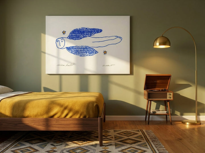 Stretched canvas wall art styled on the wall in a mid-century bedroom