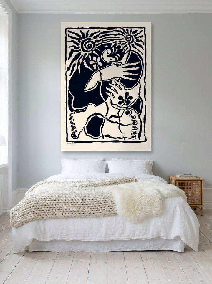 Stretched canvas wall art styled on the wall in a bright Scandinavian bedroom