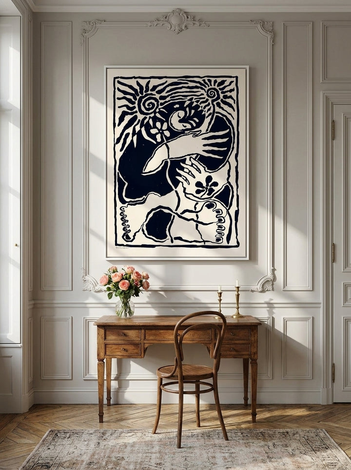 Canvas wall art with a white surround styled on the wall in a Parisian home office