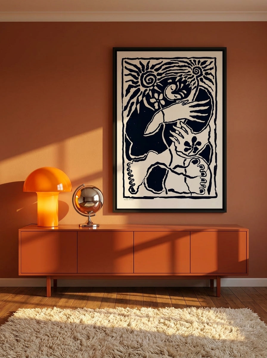 Canvas wall art with a black surround styled on the wall in a retro 70s living room