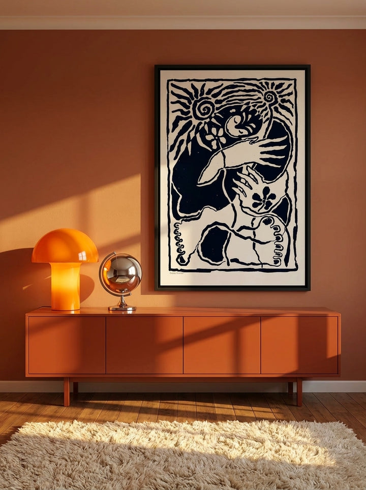 Canvas wall art with a black surround styled on the wall in a retro 70s living room
