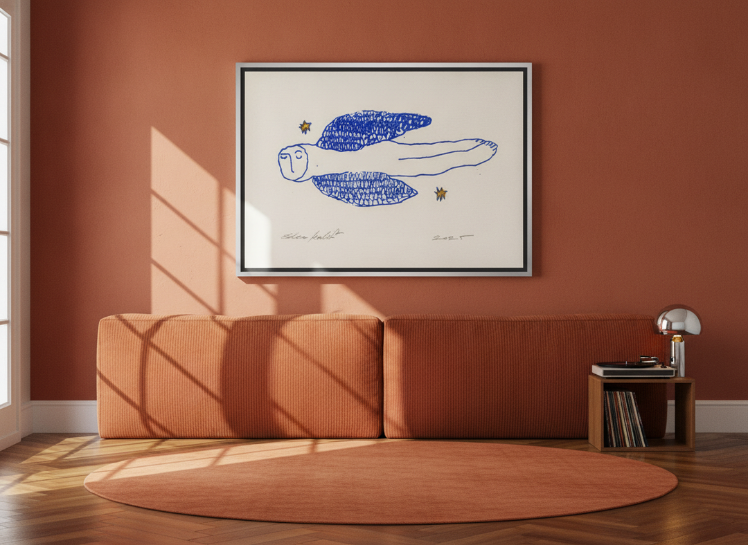 Canvas wall art with a silver leaf surround styled on the wall in a retro 70s bedroom