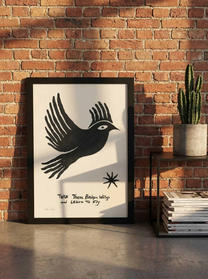 Modern wall art print leaning against the wall in an industrial loft bedroom