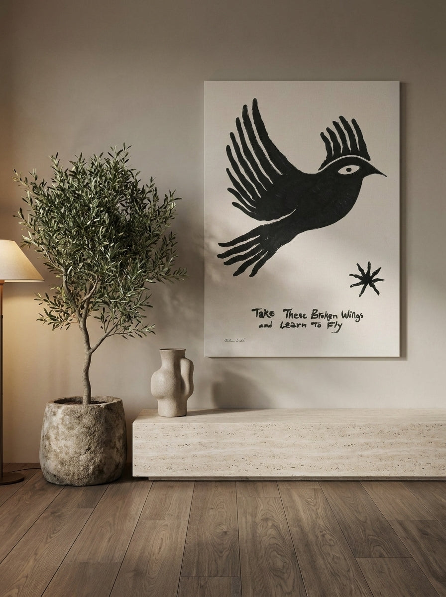 Stretched canvas wall art styled on the wall in a luxe living room