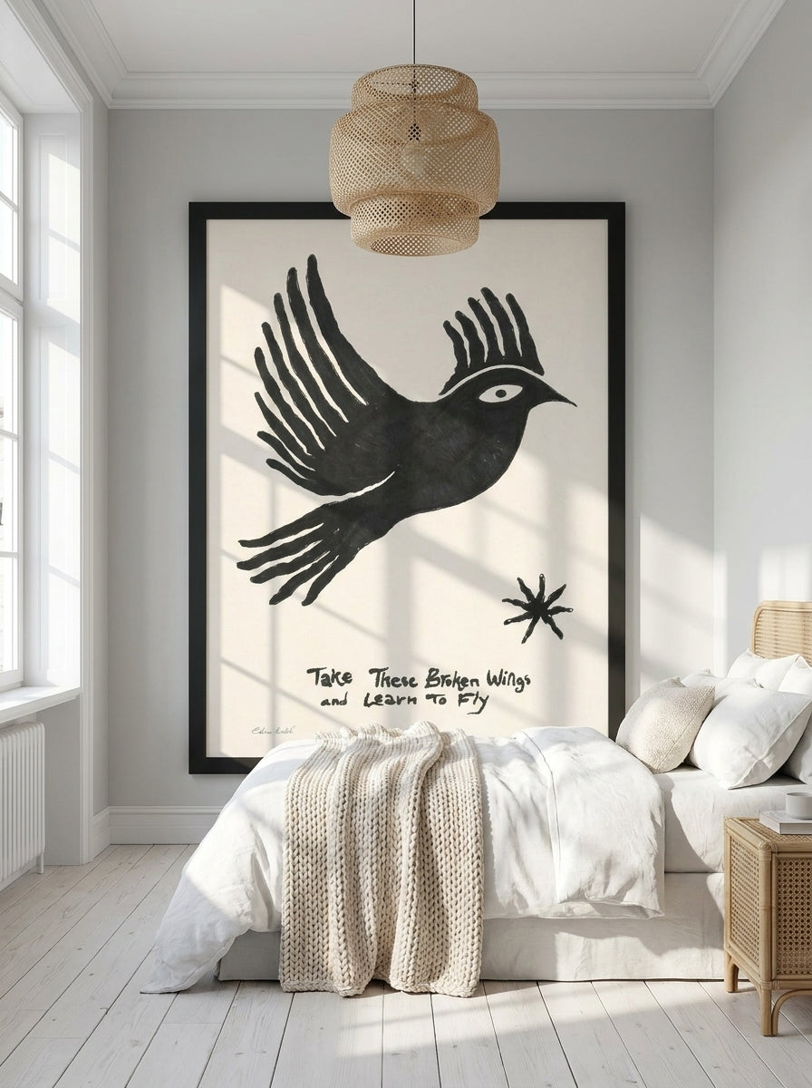 Oversized statement modern wall art print styled on the wall in a bright Scandinavian bedroom