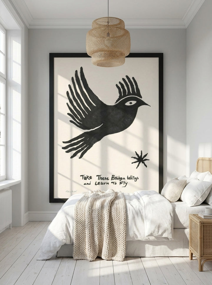 Oversized statement modern wall art print styled on the wall in a bright Scandinavian bedroom