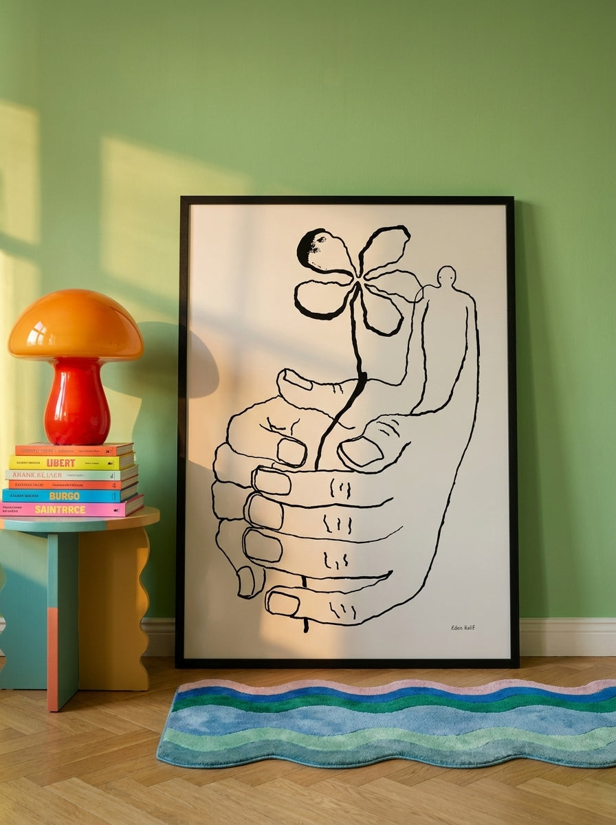 Oversized statement modern wall art print leaning against the wall in a colourful eclectic living room
