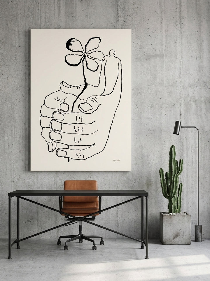 Stretched canvas wall art styled on the wall in an industrial loft home office