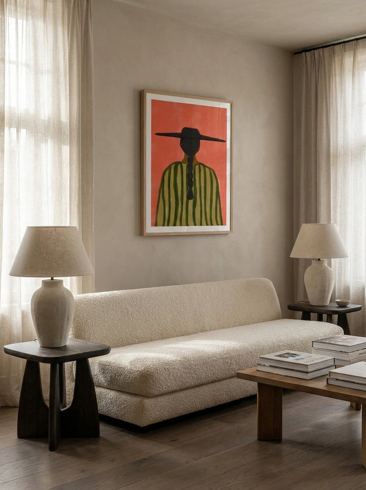 Modern wall art print styled on the wall in a luxe living room