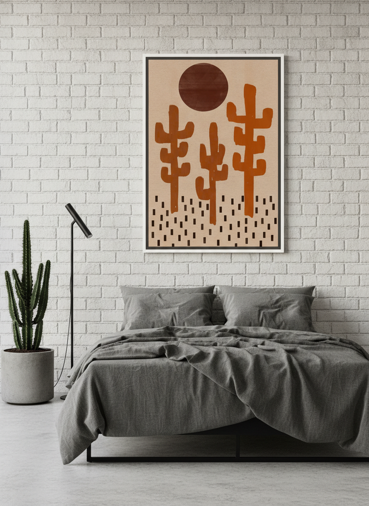 Canvas wall art with a white surround styled on the wall in an industrial loft bedroom