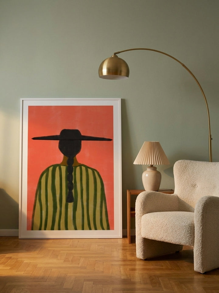 Oversized statement modern wall art print leaning against the wall in a mid-century living room
