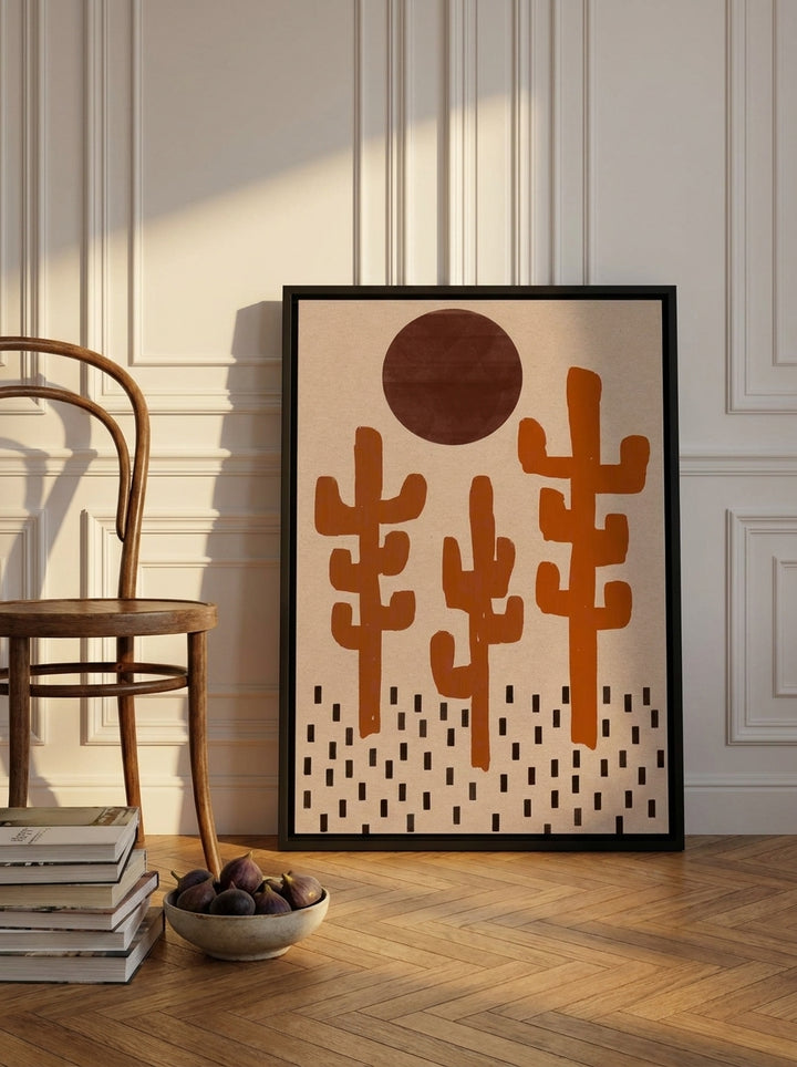 Canvas wall art with a black surround leaning against the wall in a Parisian living room