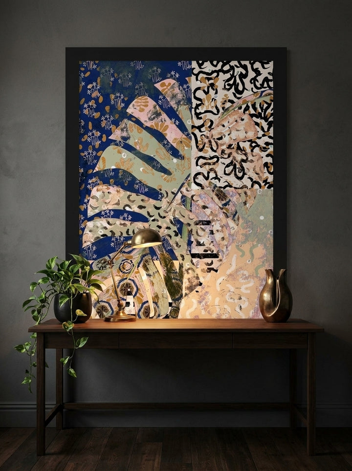 Modern wall art print styled on the wall in a moody home office