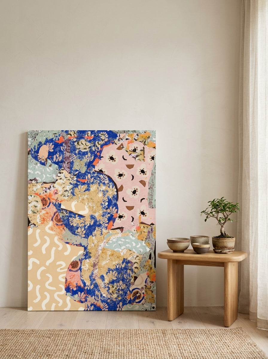 Stretched canvas wall art leaning against the wall in a warm Japandi bedroom
