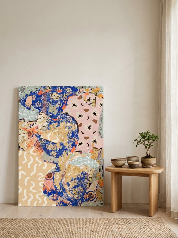 Stretched canvas wall art leaning against the wall in a warm Japandi bedroom
