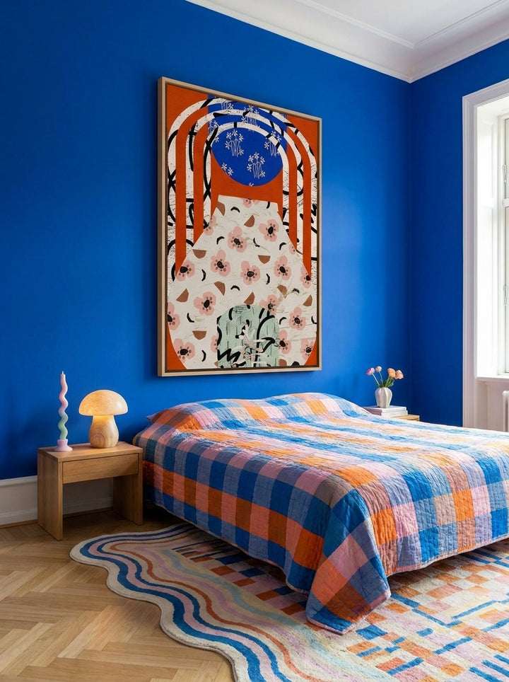 Oversized statement canvas wall art with a natural timber surround styled on the wall in a colourful eclectic bedroom