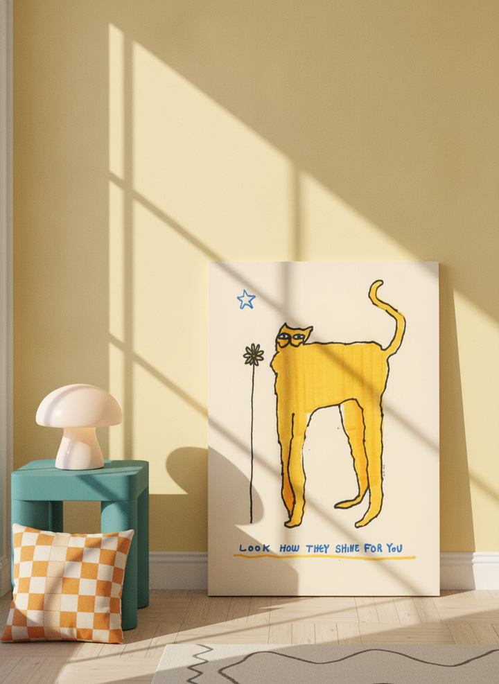 Stretched canvas wall art leaning against the wall in a colourful eclectic nursery