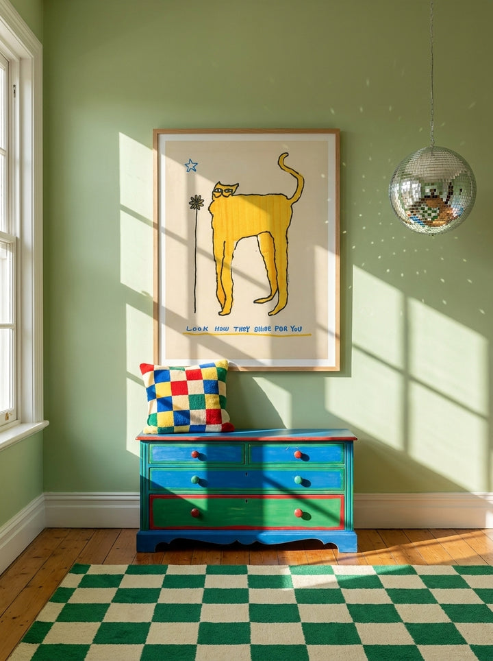 Modern wall art print styled on the wall in a colourful eclectic nursery