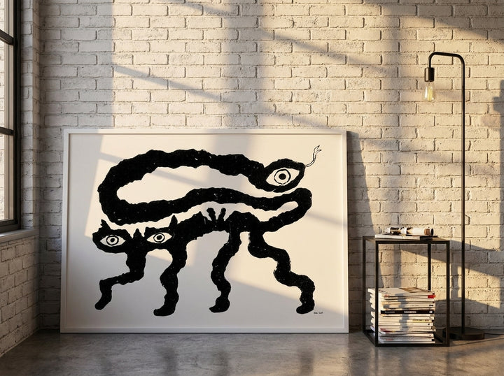 Modern wall art print leaning against the wall in an industrial loft home office