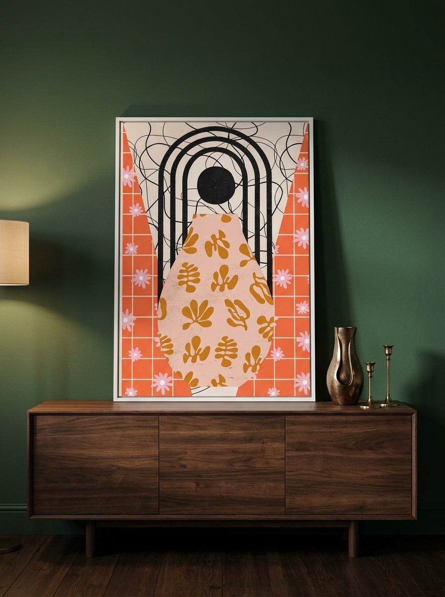 Modern wall art print standing on a sideboard in a moody home office