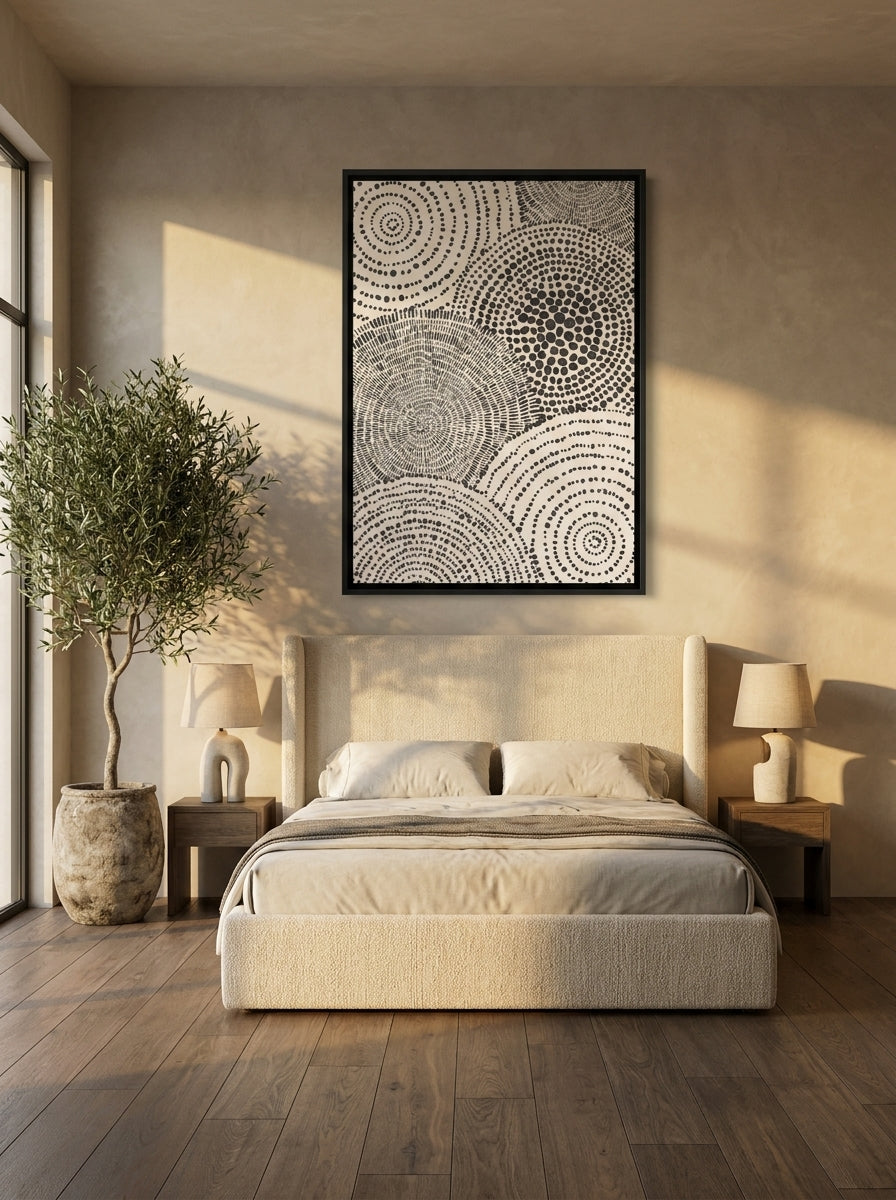 Oversized statement canvas wall art with a black surround styled on the wall in a luxe bedroom