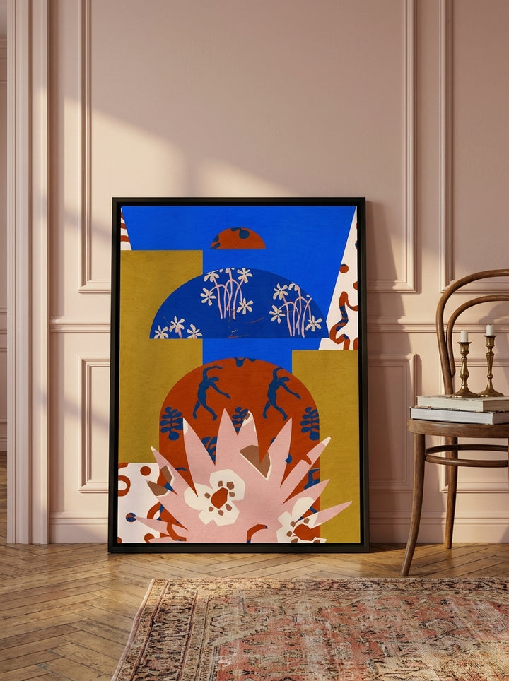 Canvas wall art with a black surround leaning against the wall in a Parisian home office