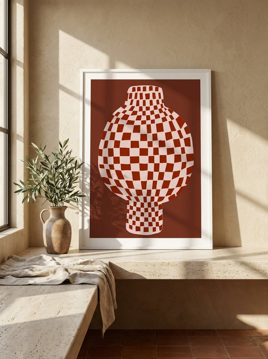 Modern wall art print standing on a kitchen bench in a Mediterranean kitchen